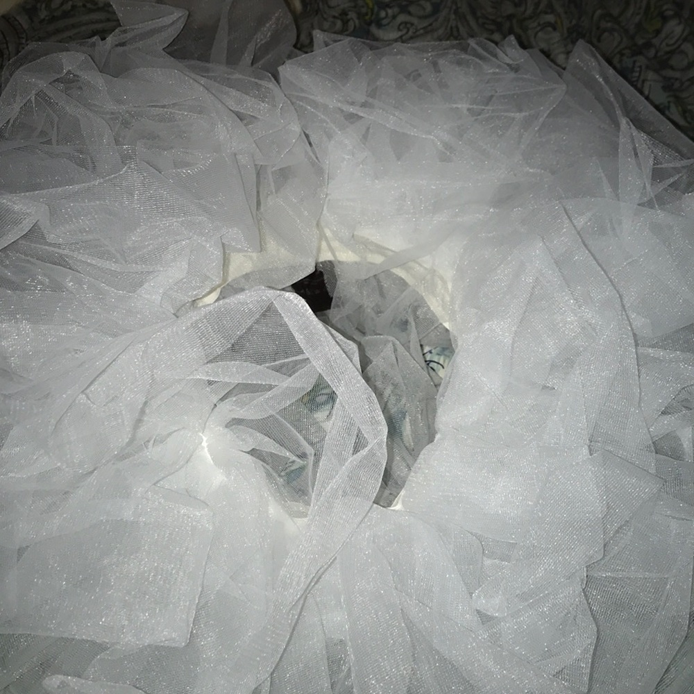 A Halloween skirt and white lace belt